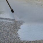 removing oil stains of exposed aggregate driveway