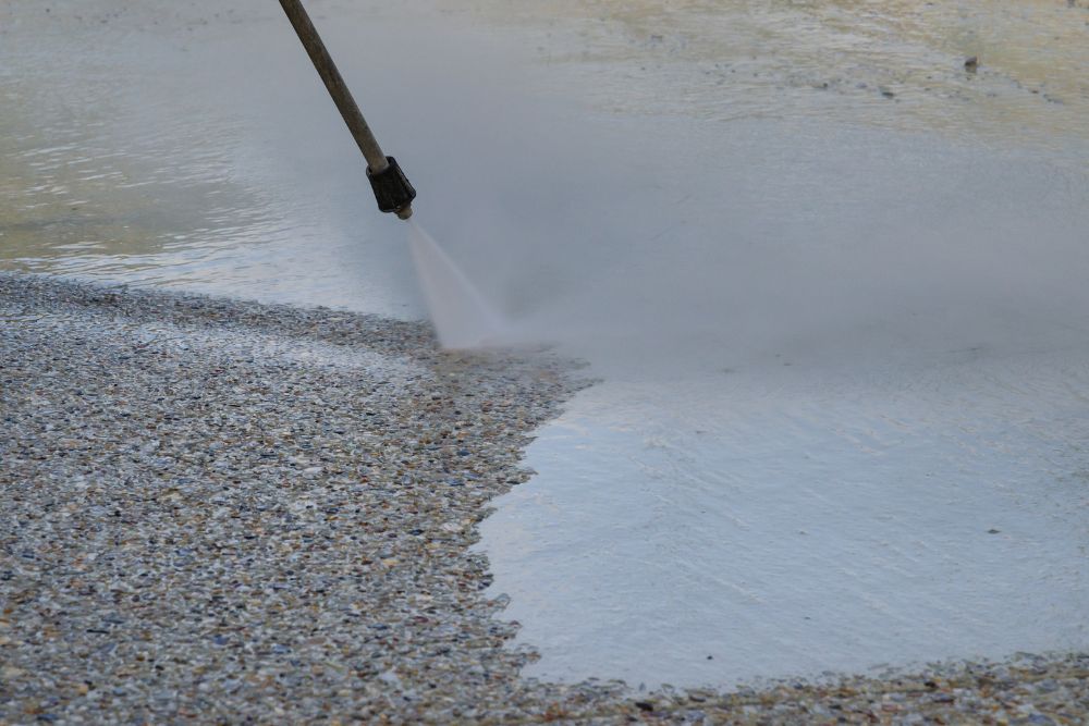 removing oil stains of exposed aggregate driveway